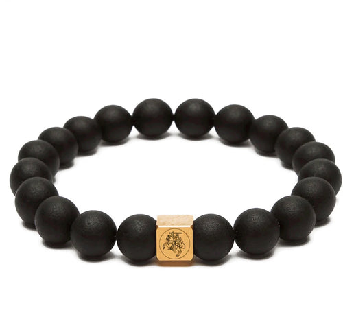 Baltic amber black bracelet with gold-plated Vytis emblem